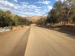 609 Squaw Valley Road Squaw Valley, CA 93675 - Photo 3 of 11 a view of a yard with snow on the road