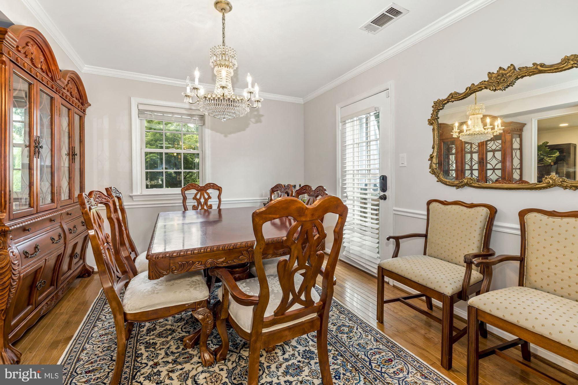 6665 Fairfax Road, Unit 92 Chevy Chase, MD 20815 - Photo 9 of 29 Dining Room opens to back-deck