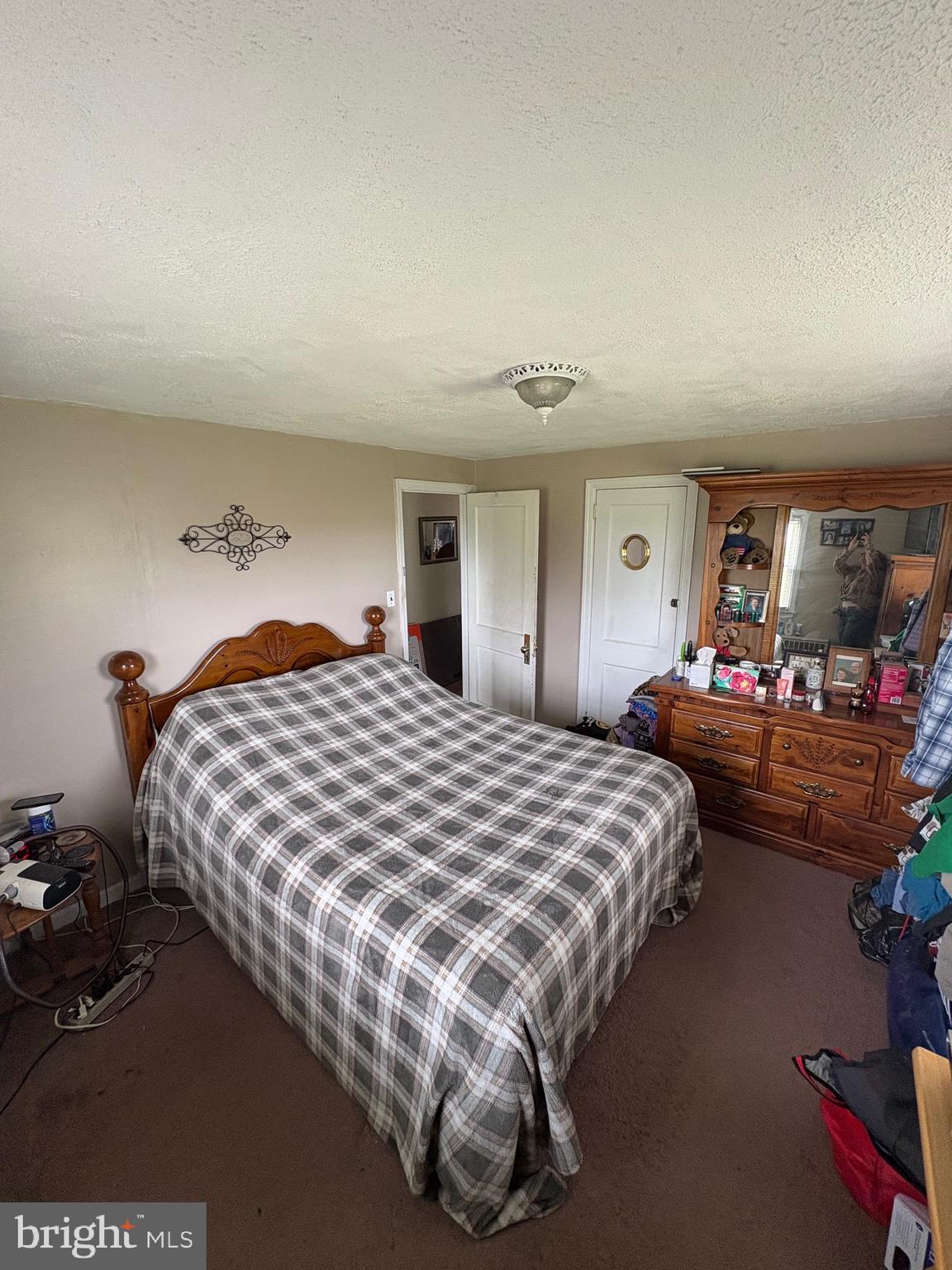 492 Highway 40 Elmer, NJ 08318 - Photo 14 of 30 a bedroom with bed and window