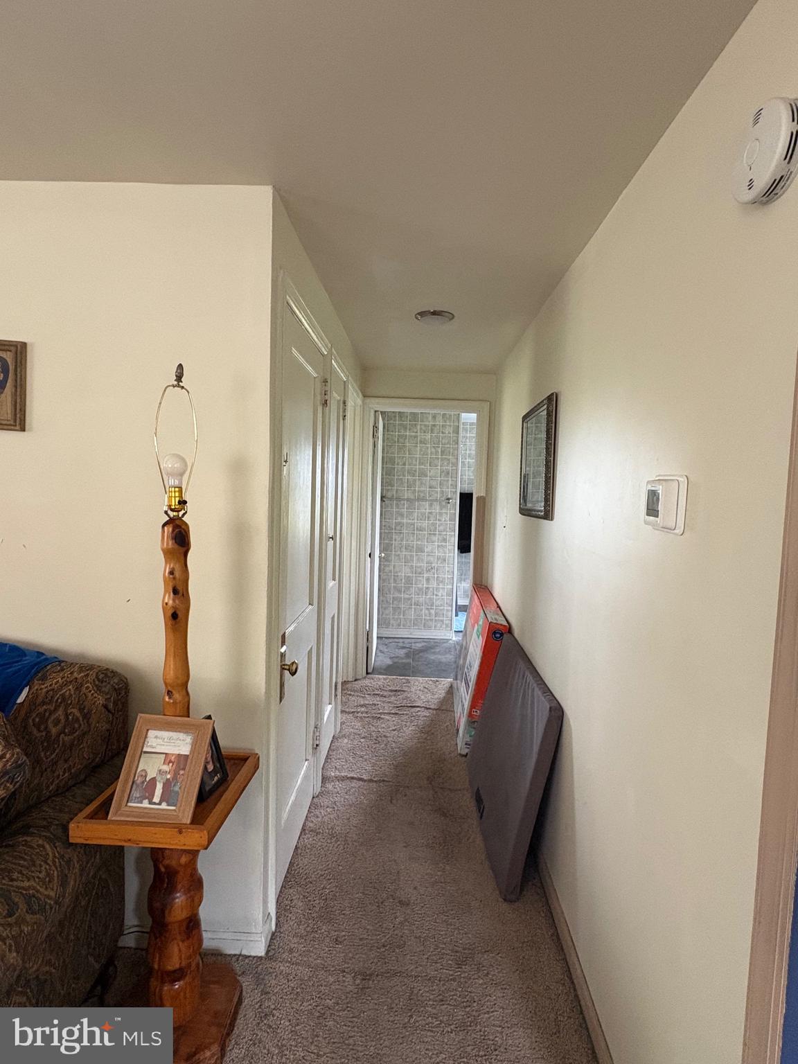 492 Highway 40 Elmer, NJ 08318 - Photo 10 of 30 a living room with furniture and a rug