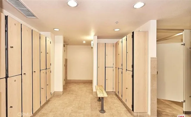 a living room with furniture a rug and a window