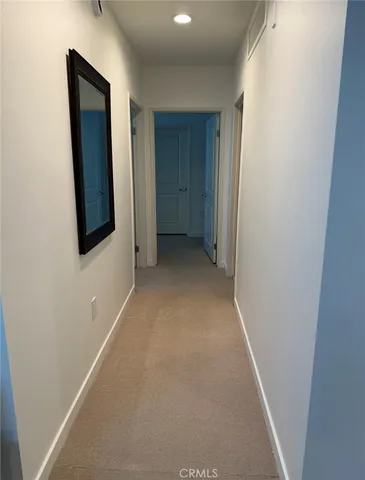 a bathroom with a sink a mirror and a shower