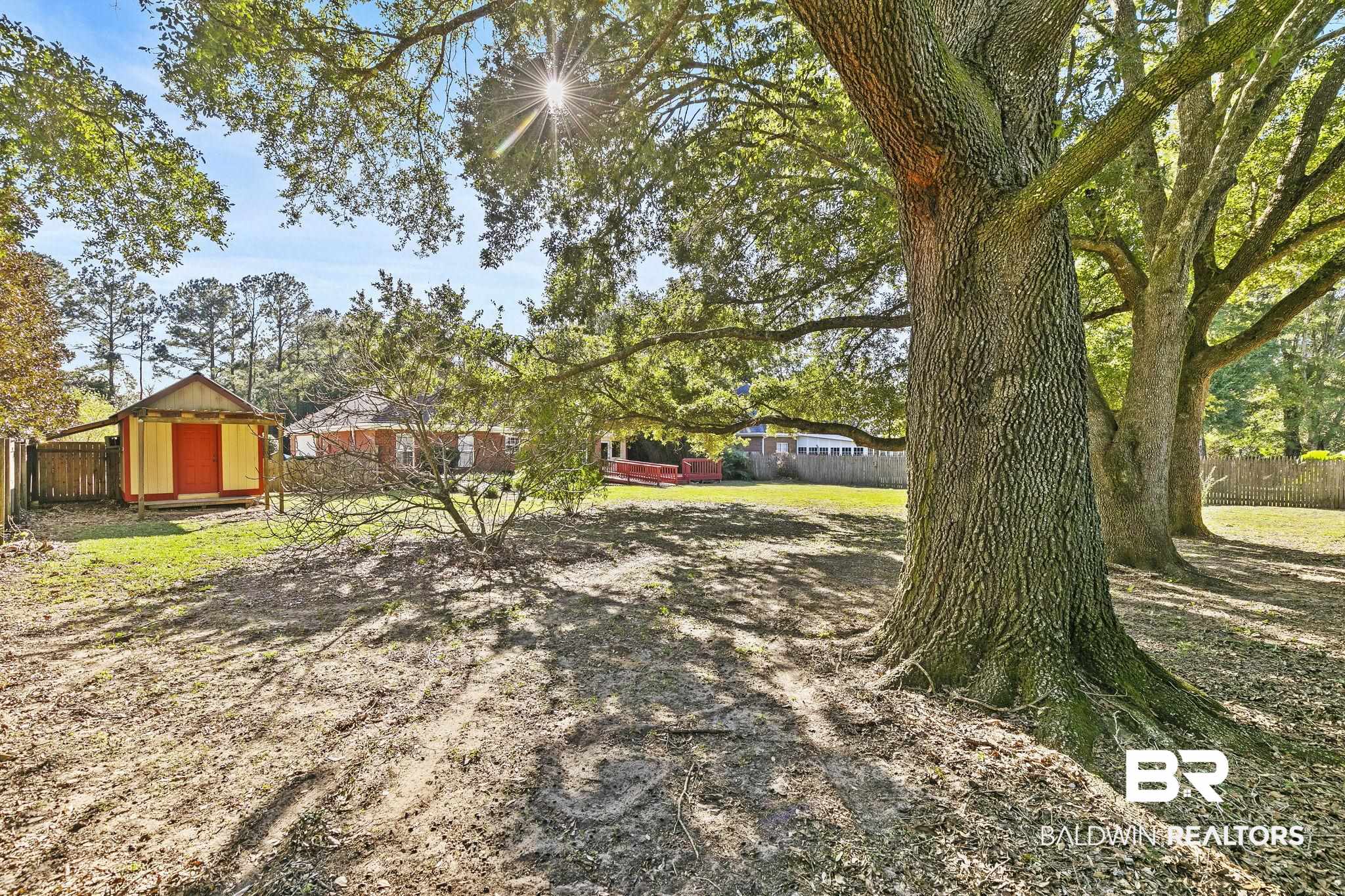 9631 Bay Meadows Avenue Fairhope, AL 36532 - Photo 45 of 49 View of yard featuring a shed