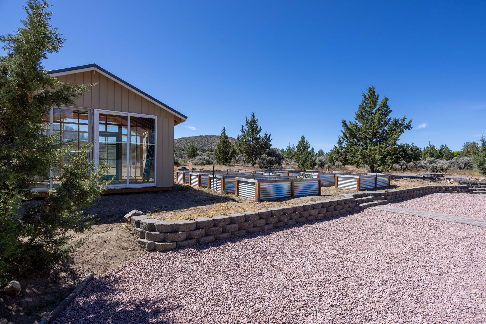 14224 Southwest Howlett Drive Powell Butte, OR 97753 - Photo 26 of 45 Greenhouse & garden beds