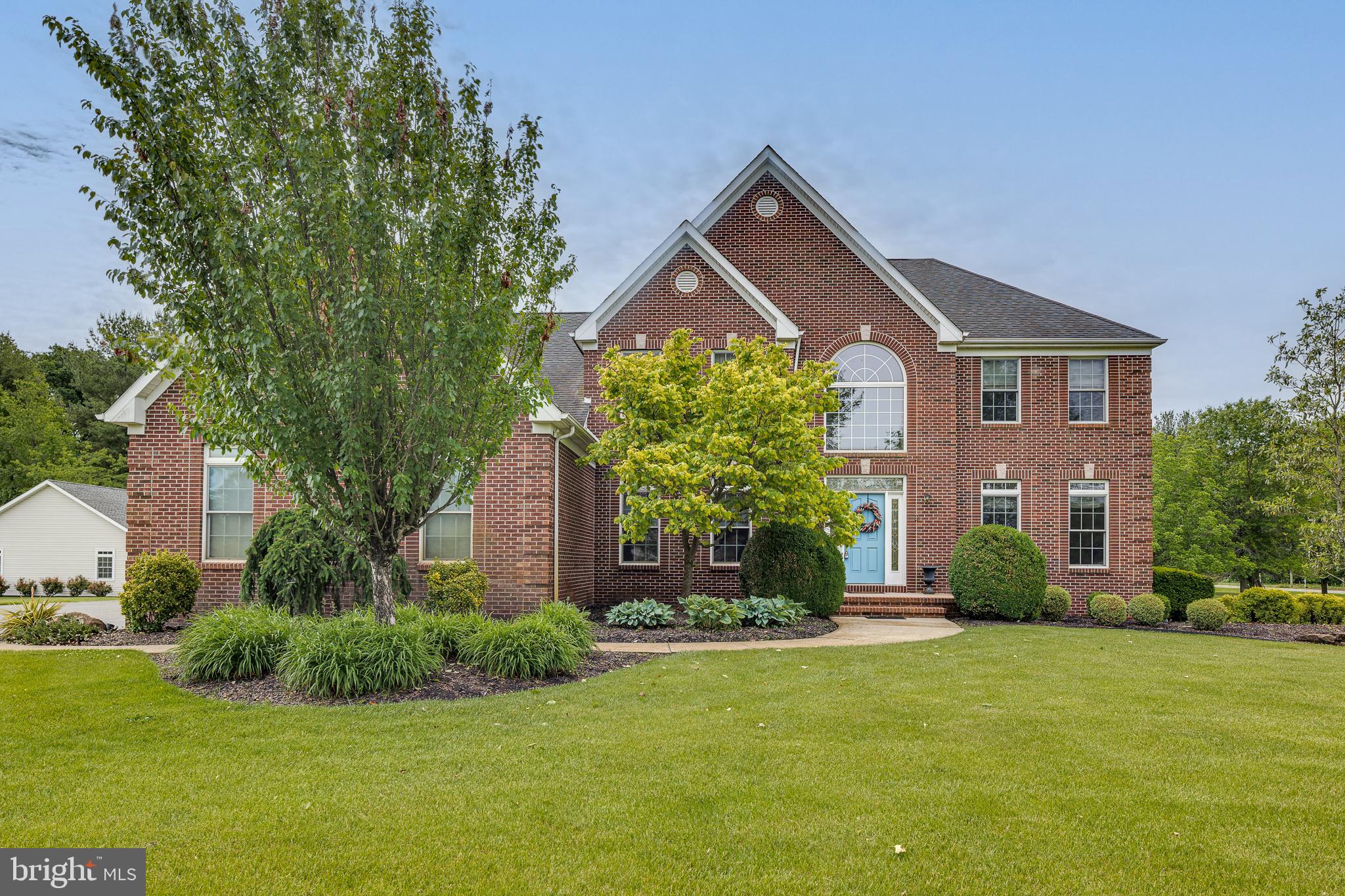 2 Dellaira Court Wrightstown, NJ 08562 - Photo 2 of 93 a front view of a house with a yard