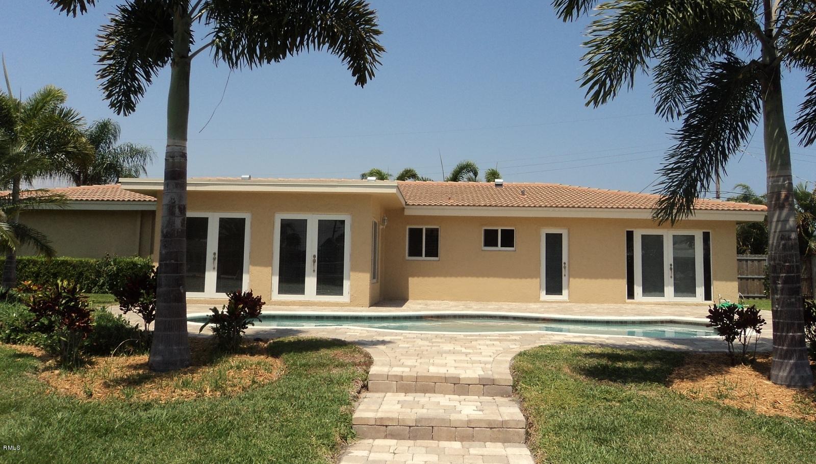 2130 Northeast 30th Street Lighthouse Point, FL 33064 - Photo 14 of 24 Back of House from Canal