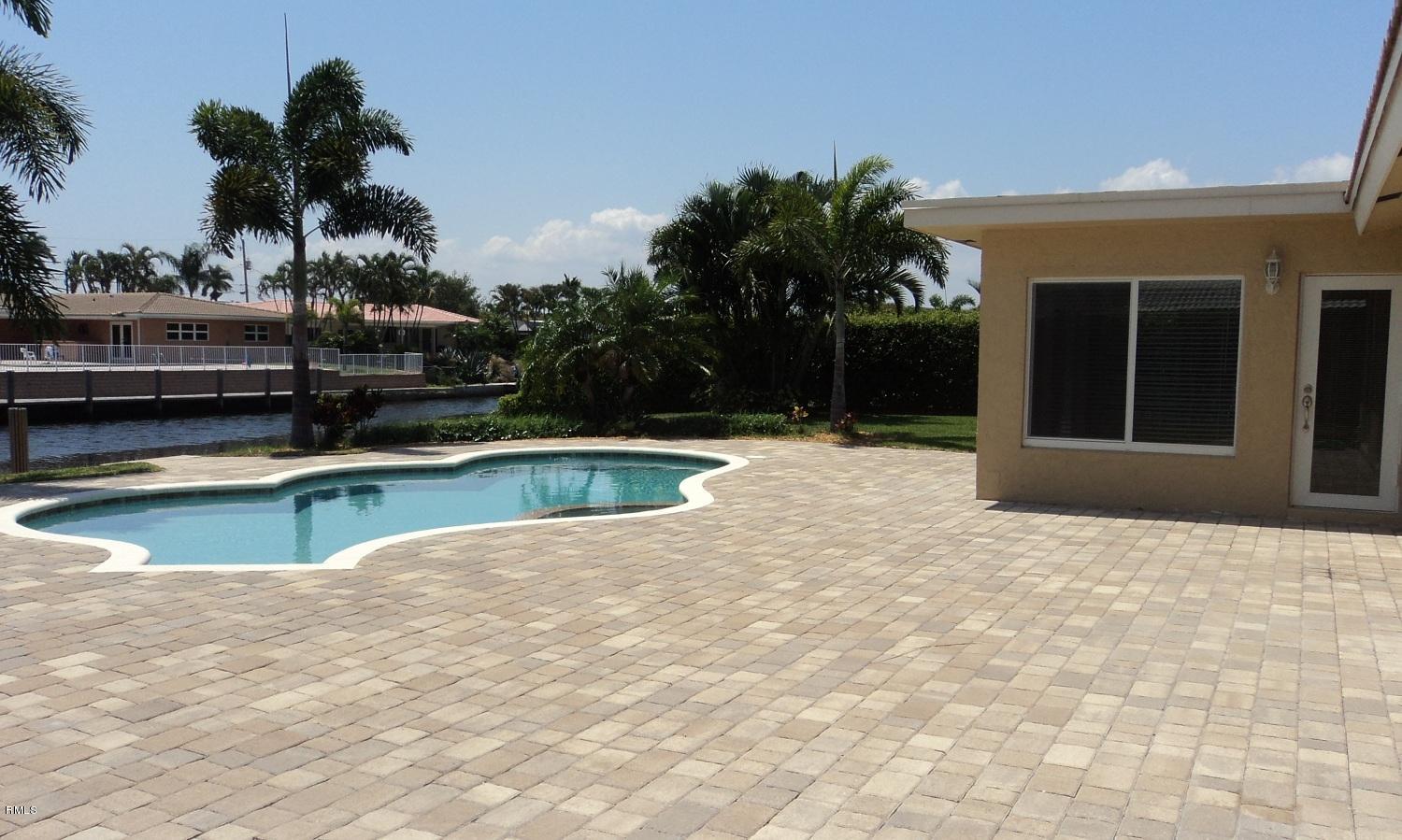 2130 Northeast 30th Street Lighthouse Point, FL 33064 - Photo 8 of 24 Pool and Patio Area