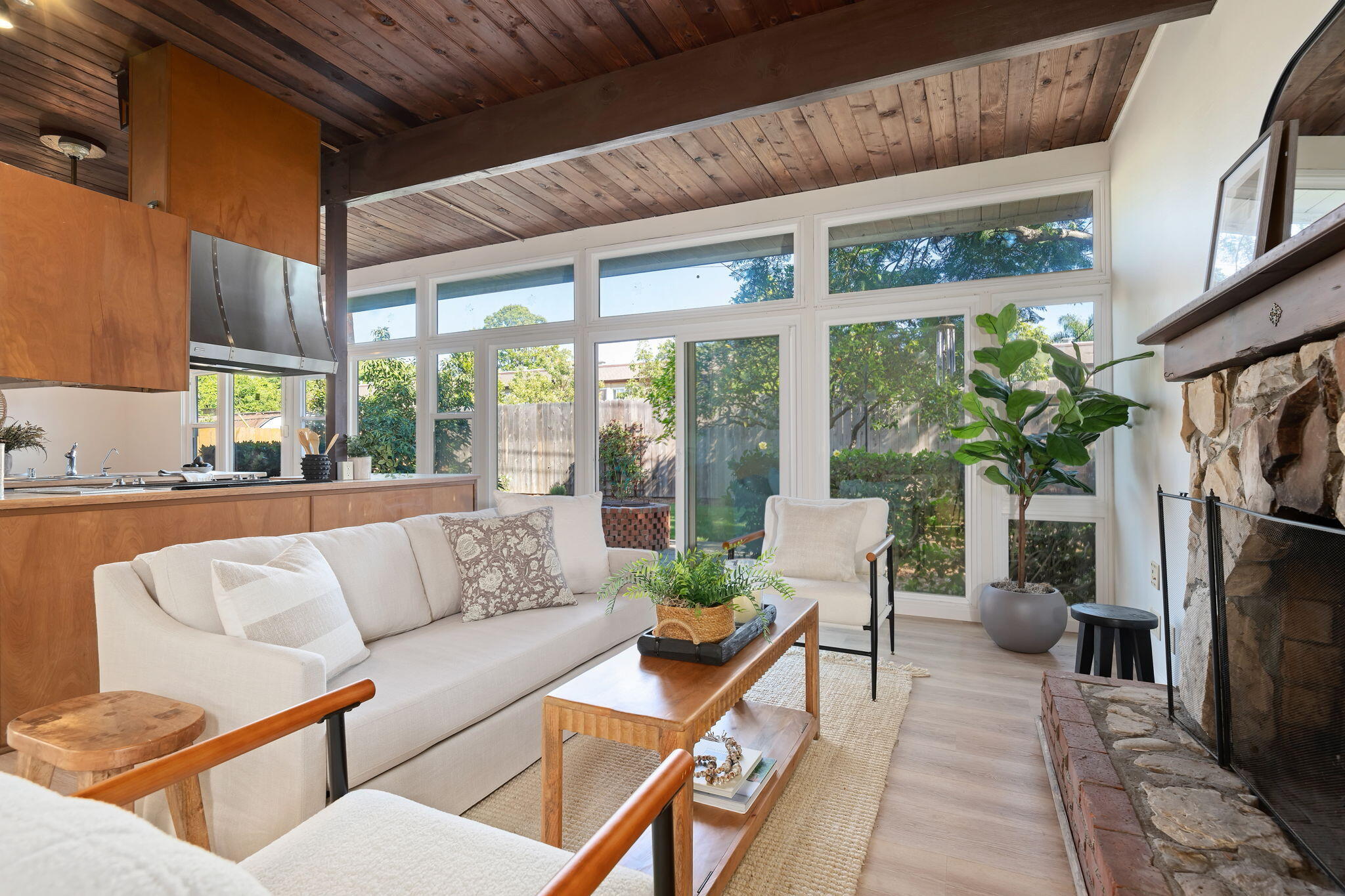 122 Kinman Avenue Goleta, CA 93117 - Photo 2 of 20 a balcony with furniture and a fireplace