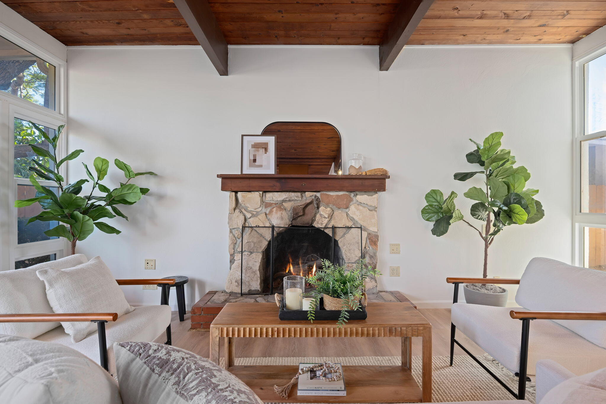 122 Kinman Avenue Goleta, CA 93117 - Photo 4 of 20 a living room with furniture and a fireplace