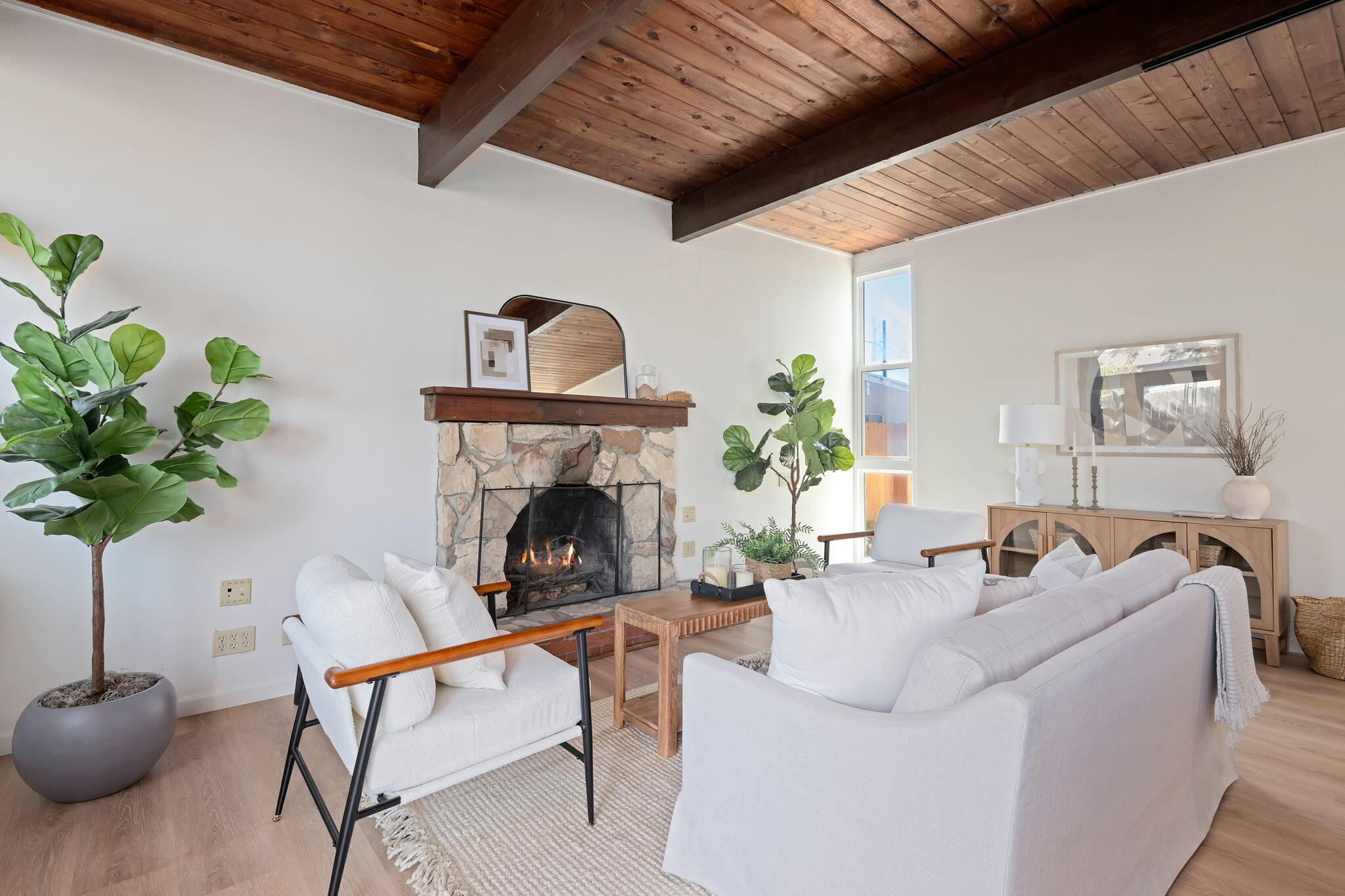 122 Kinman Avenue Goleta, CA 93117 - Photo 5 of 20 a living room with furniture and a potted plant