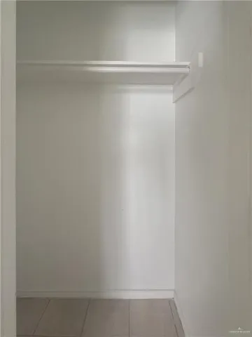 a view of small space with racks on the wall