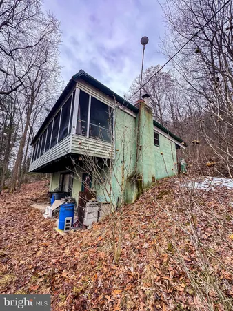 a front view of a house with street