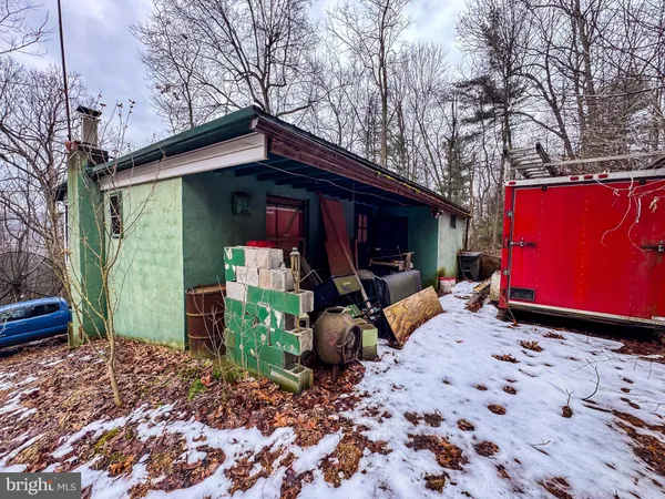 a view of a backyard with a patio