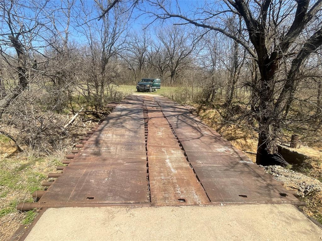 3141 Rogers Road Jacksboro, TX 76458 - Photo 33 of 40 Bridge built with a train car