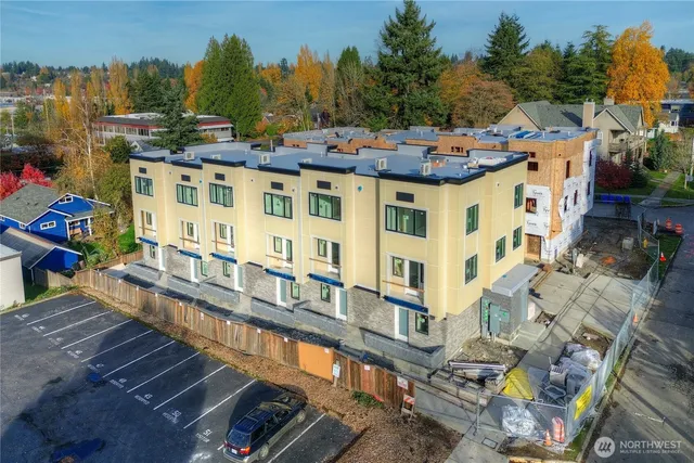 a view of a building with a yard