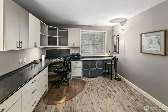 a kitchen with a sink and a stove