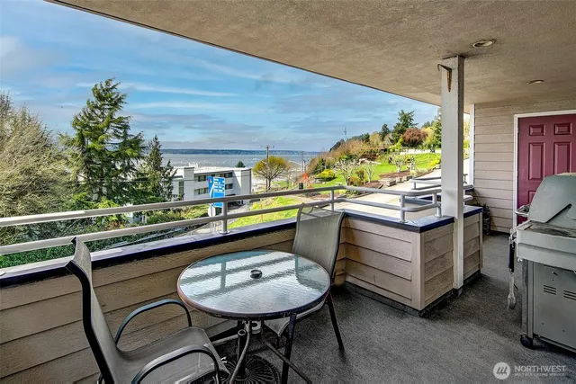 a view of parking garage with cars