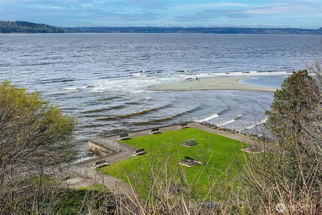an aerial view of a house with outdoor space