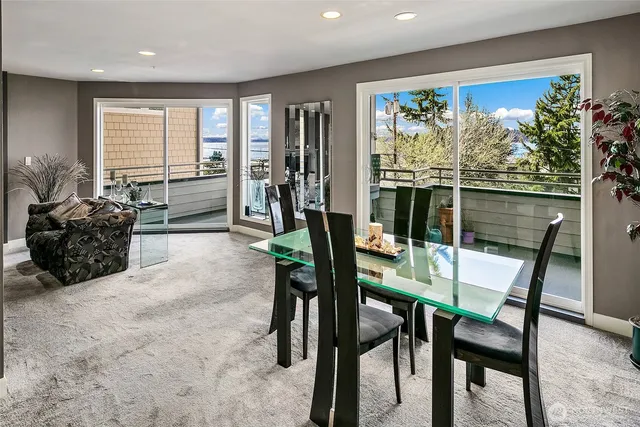 a view of a dining room with furniture window and outside view