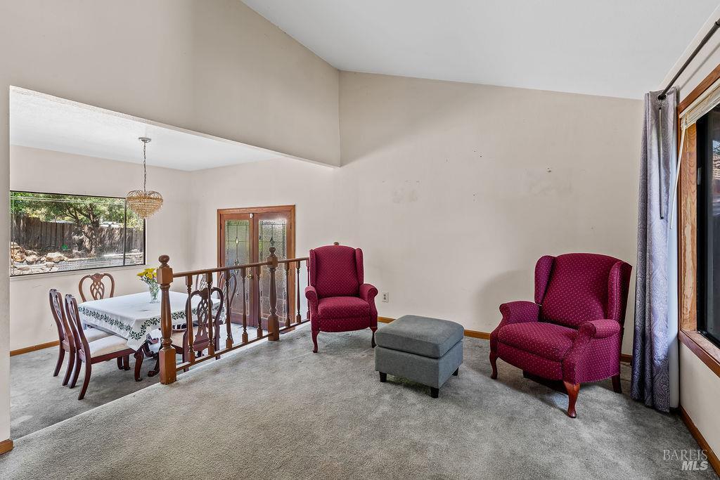 715 Placer Court Santa Rosa, CA 95401 - Photo 8 of 37 a living room with furniture and a chair