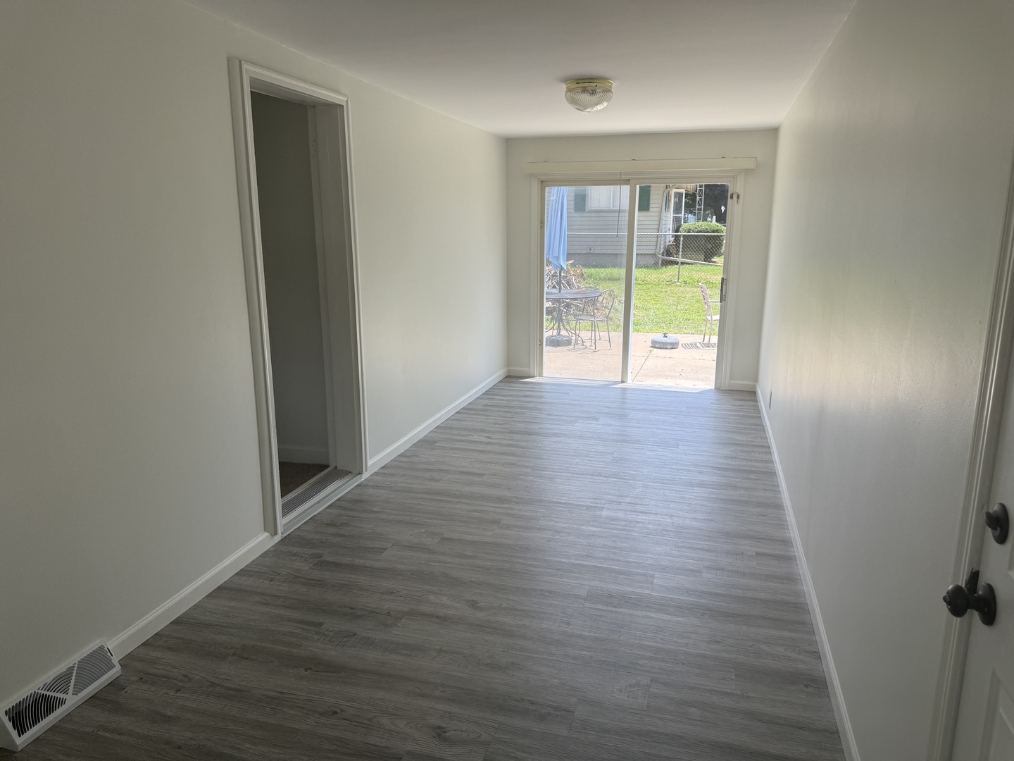 126 8th Street Hennepin, IL 61327 - Photo 15 of 17 wooden floor in an empty room with a window