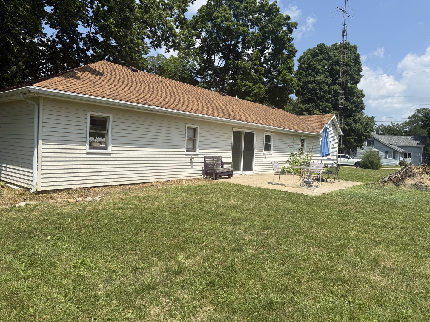 126 8th Street Hennepin, IL 61327 - Photo 16 of 17 a front view of a house with garden