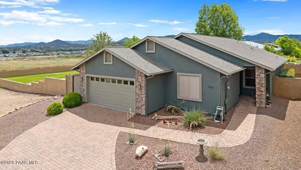 a house view with a garden space