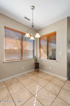 a bathroom with a sink a mirror and a toilet
