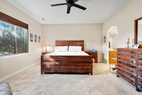 a bathroom with a sink double vanity and a shower