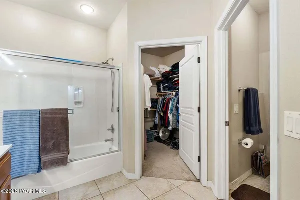 a house view with a sitting space and garden space