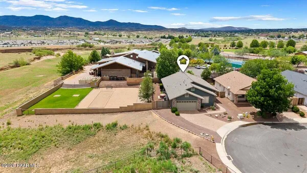 a view of a street with a house