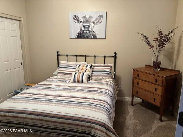 a workspace with furniture and a window