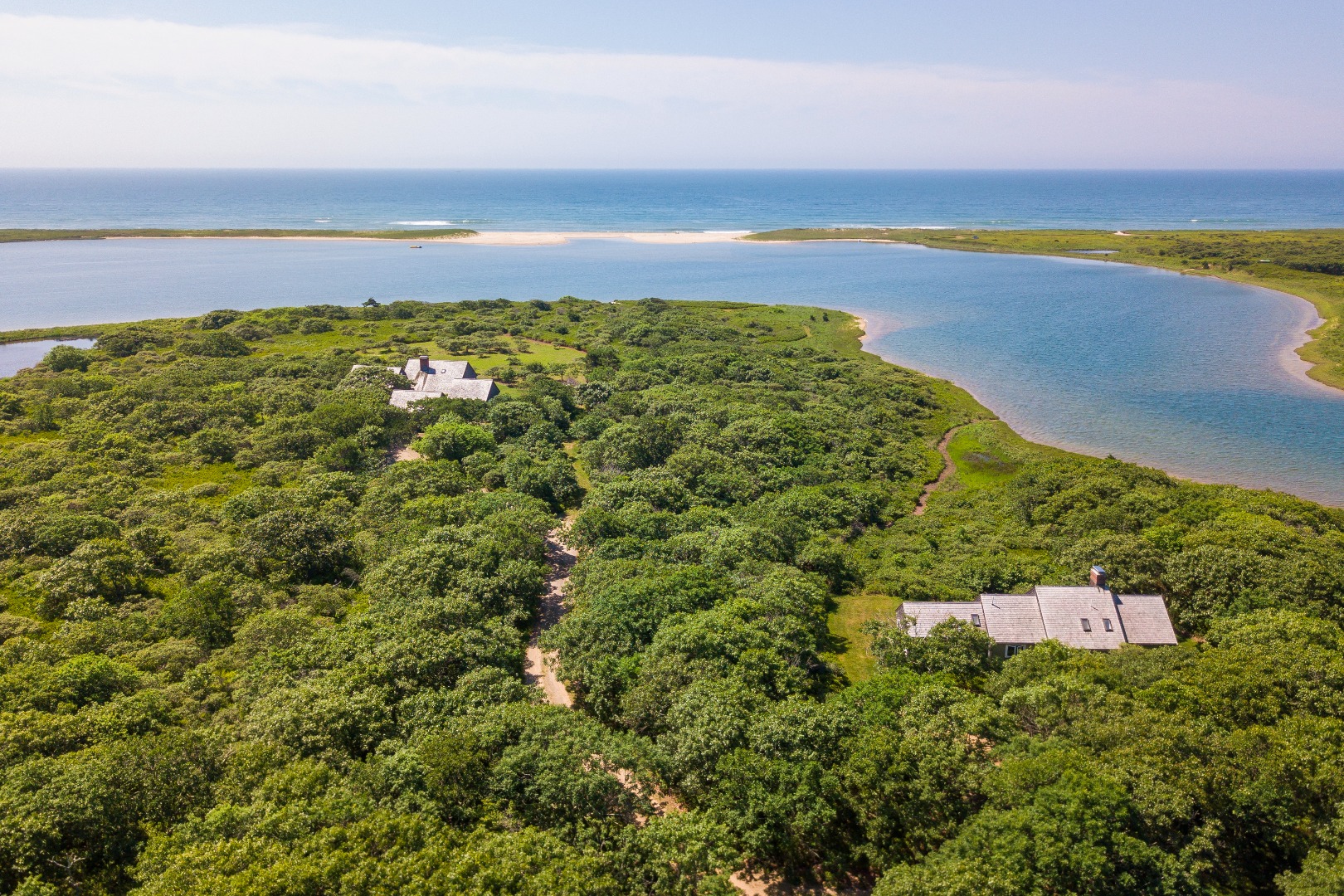 50 Oyster Watcha Road Edgartown, MA 02539 - Photo 3 of 44 a view of an ocean from a balcony