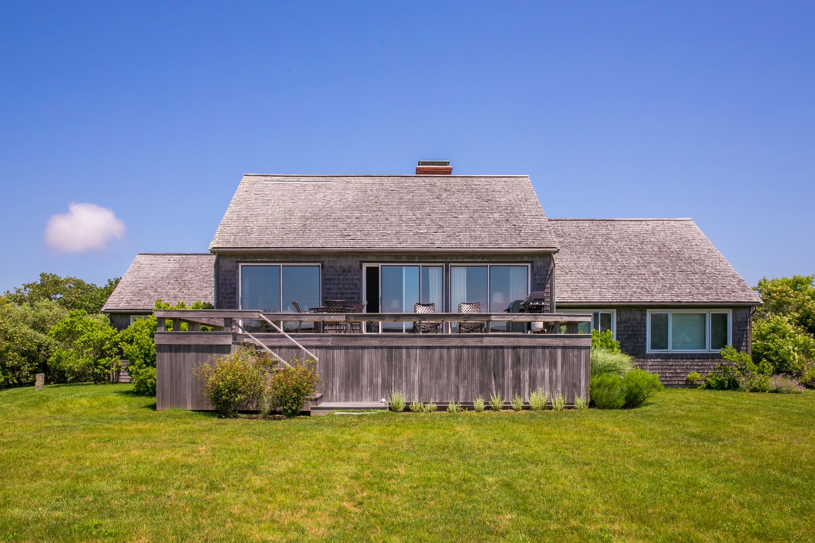 50 Oyster Watcha Road Edgartown, MA 02539 - Photo 27 of 44 a view of a house with a yard and sitting area
