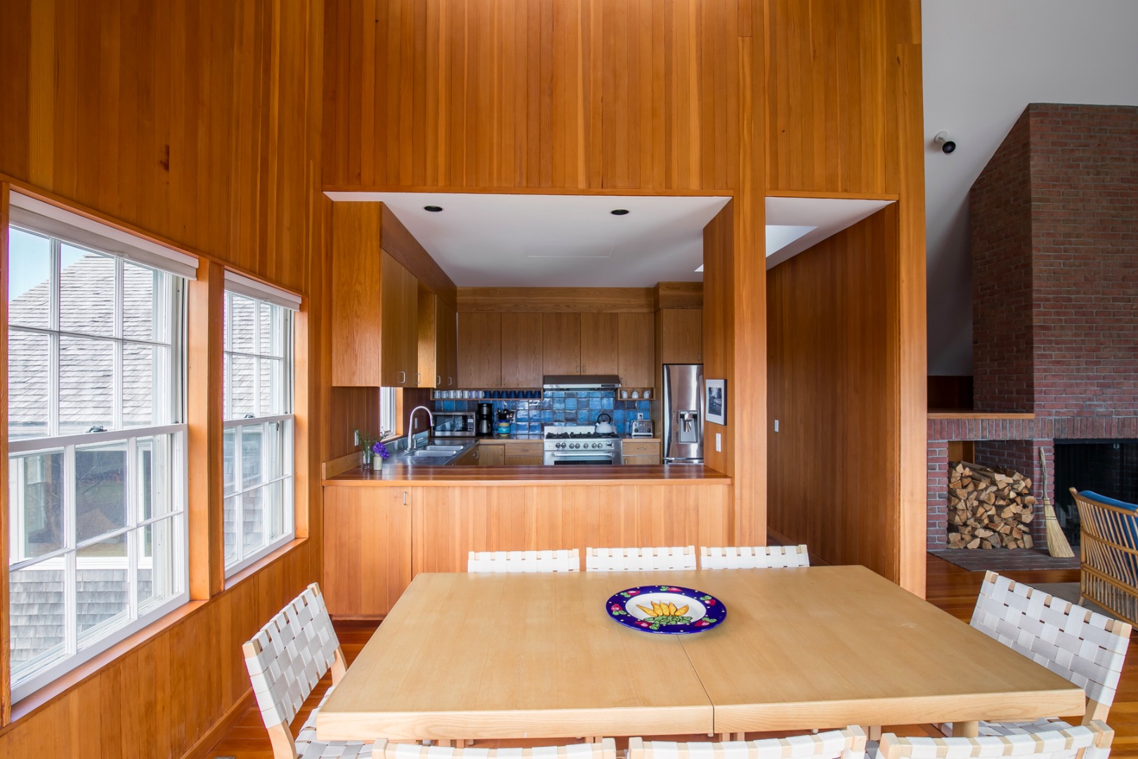 50 Oyster Watcha Road Edgartown, MA 02539 - Photo 31 of 44 a living room with a table and chairs