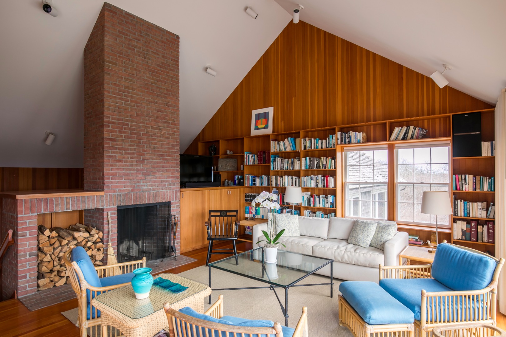 50 Oyster Watcha Road Edgartown, MA 02539 - Photo 33 of 44 a living room with furniture a fireplace and a large window