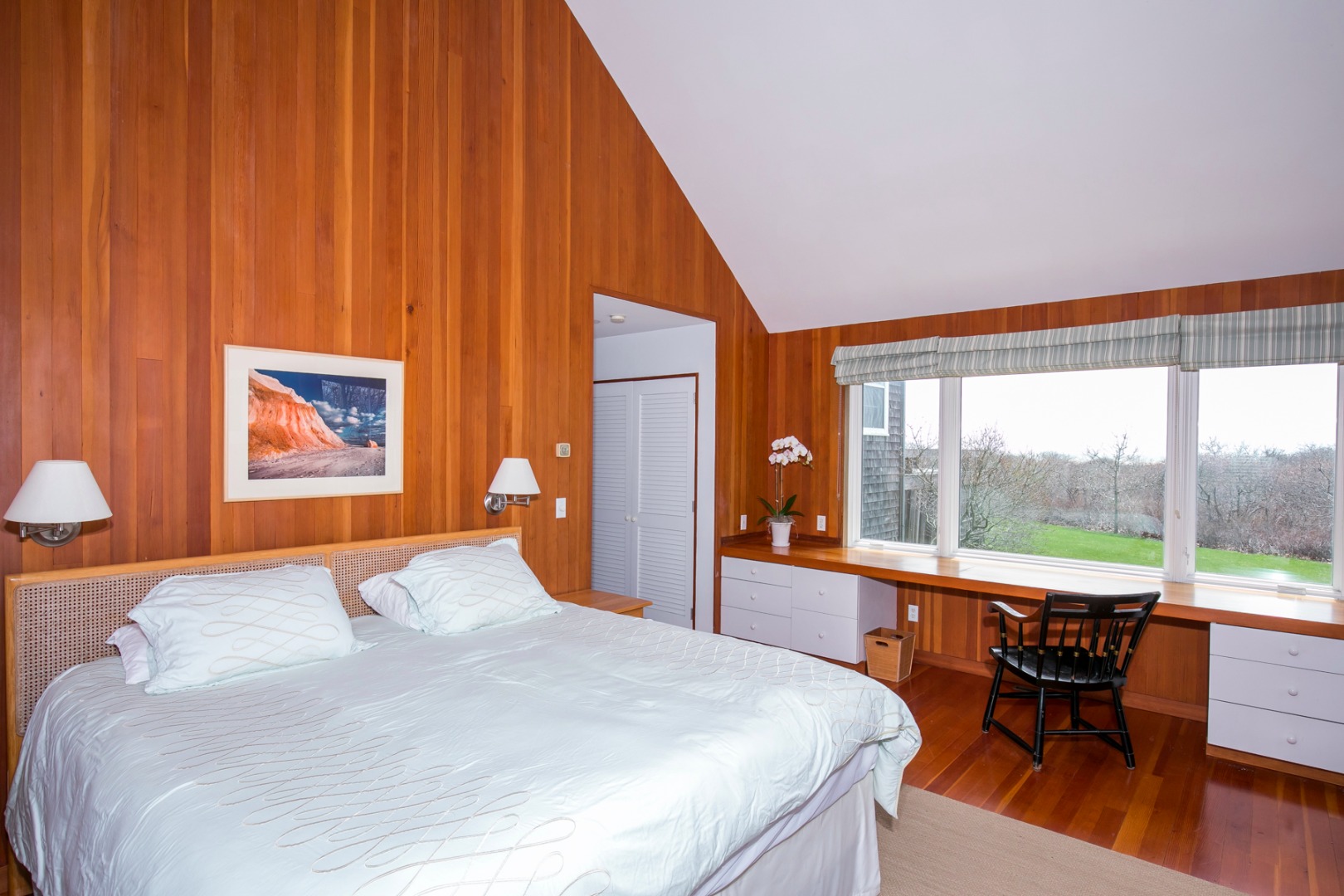 50 Oyster Watcha Road Edgartown, MA 02539 - Photo 35 of 44 a bedroom with a bed and a large window