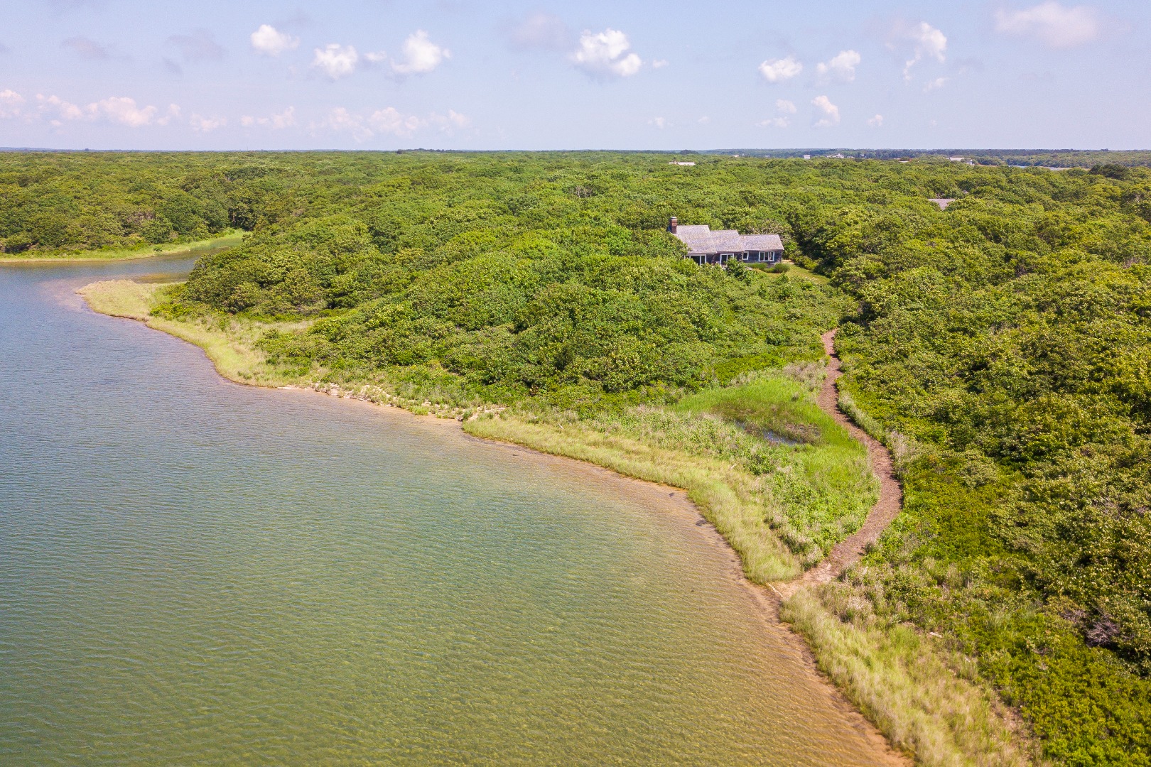 50 Oyster Watcha Road Edgartown, MA 02539 - Photo 38 of 44 a view of a yard with an outdoor space