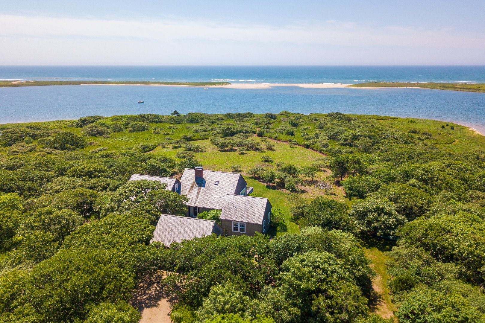 50 Oyster Watcha Road Edgartown, MA 02539 - Photo 10 of 44 a view of an ocean and beach