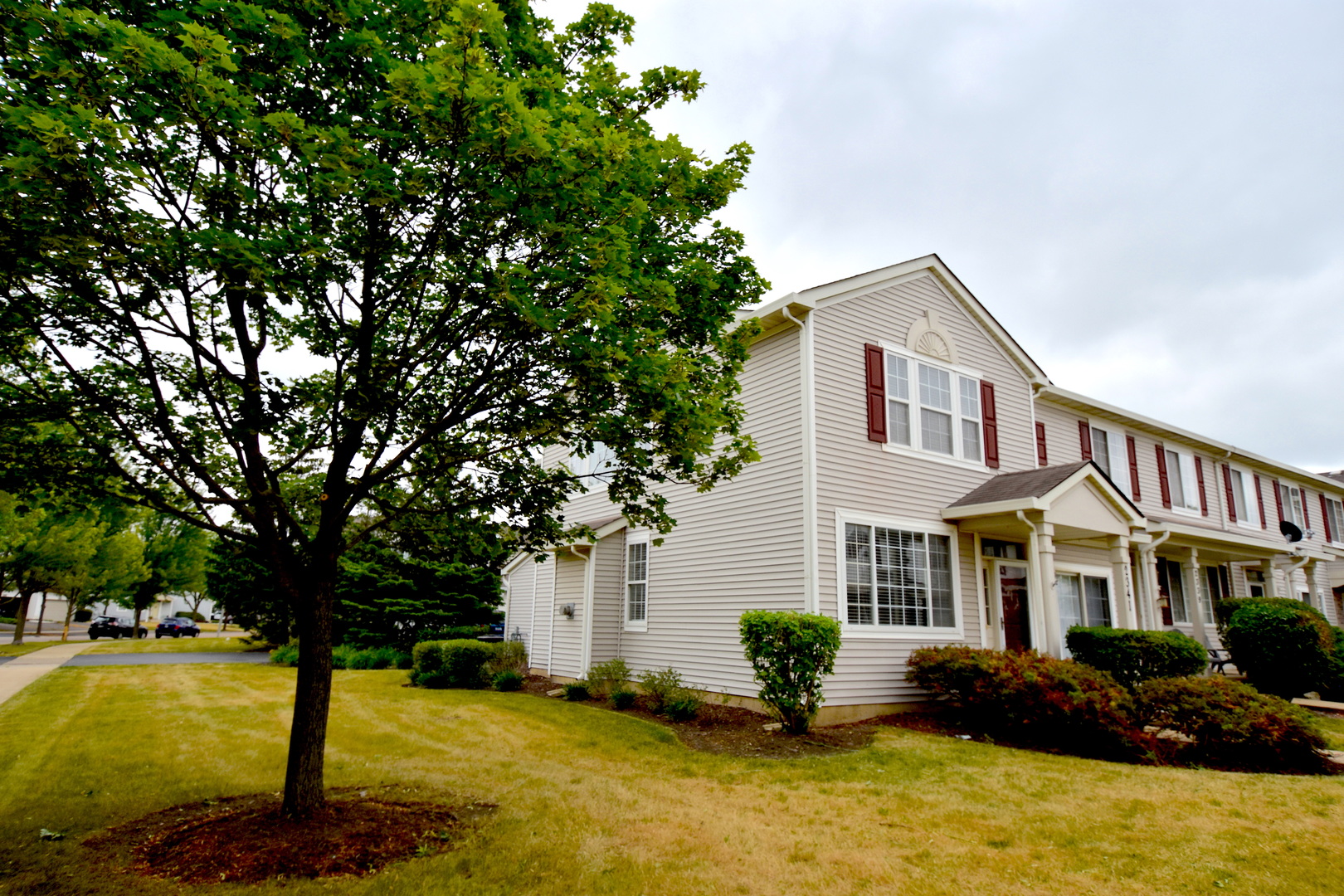 2341 Reflections Drive Aurora, IL 60502 - Photo 1 of 21 a front view of a house with yard and swimming pool