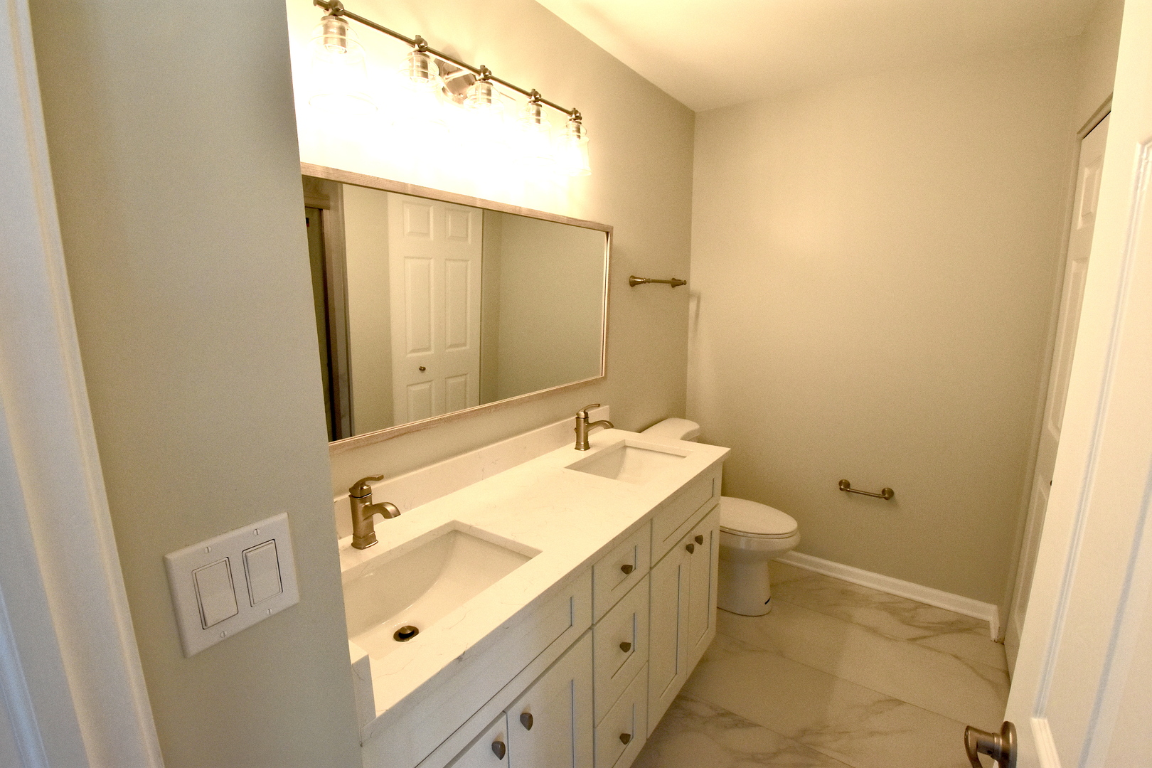 2341 Reflections Drive Aurora, IL 60502 - Photo 15 of 21 a bathroom with a sink and a mirror