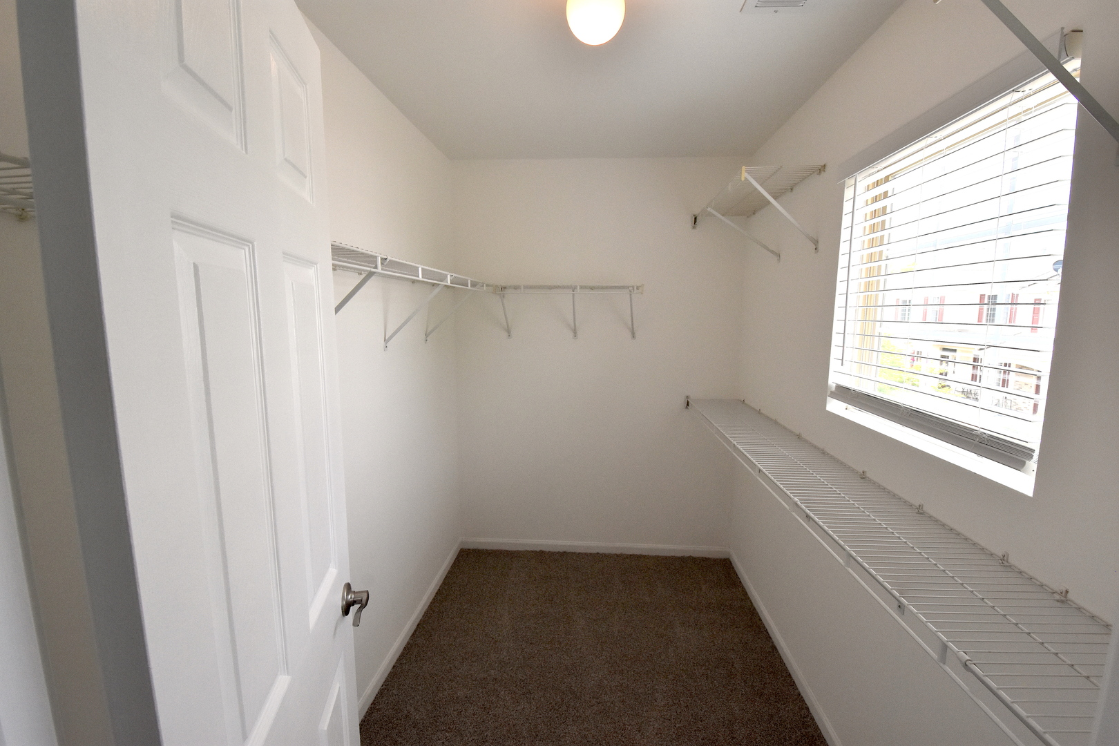 2341 Reflections Drive Aurora, IL 60502 - Photo 17 of 21 a view of an empty room with a window
