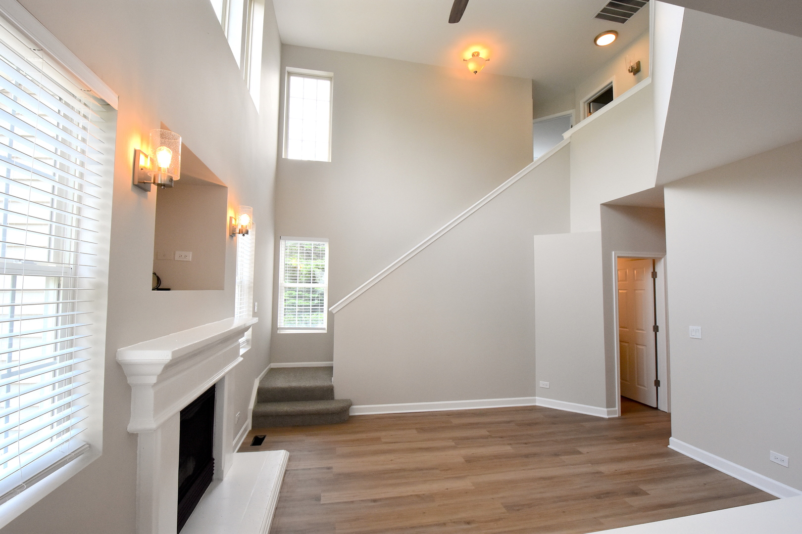 2341 Reflections Drive Aurora, IL 60502 - Photo 3 of 21 a view of entryway and hall with wooden floor