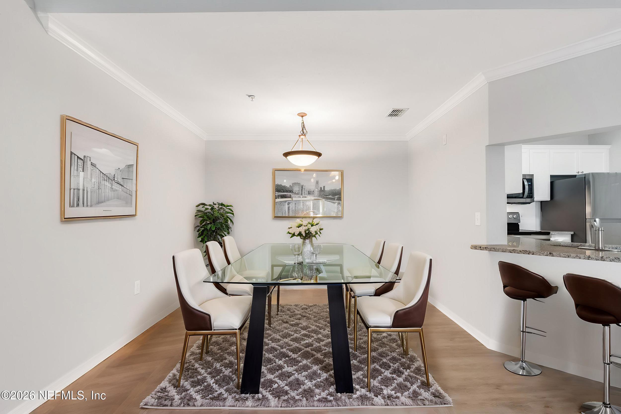 10961 Burnt Mill Road, Unit 935 Jacksonville, FL 32256 - Photo 13 of 32 dining room with furniture