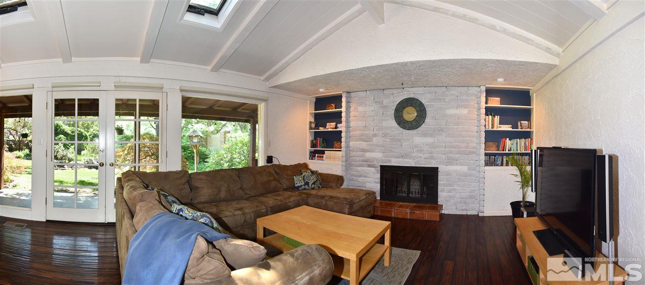 1880 Sharon Way Reno, NV 89509 - Photo 12 of 25 a living room with furniture and a fireplace