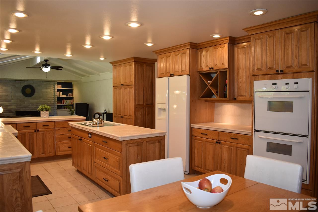 1880 Sharon Way Reno, NV 89509 - Photo 9 of 25 a kitchen with a sink appliances and cabinets