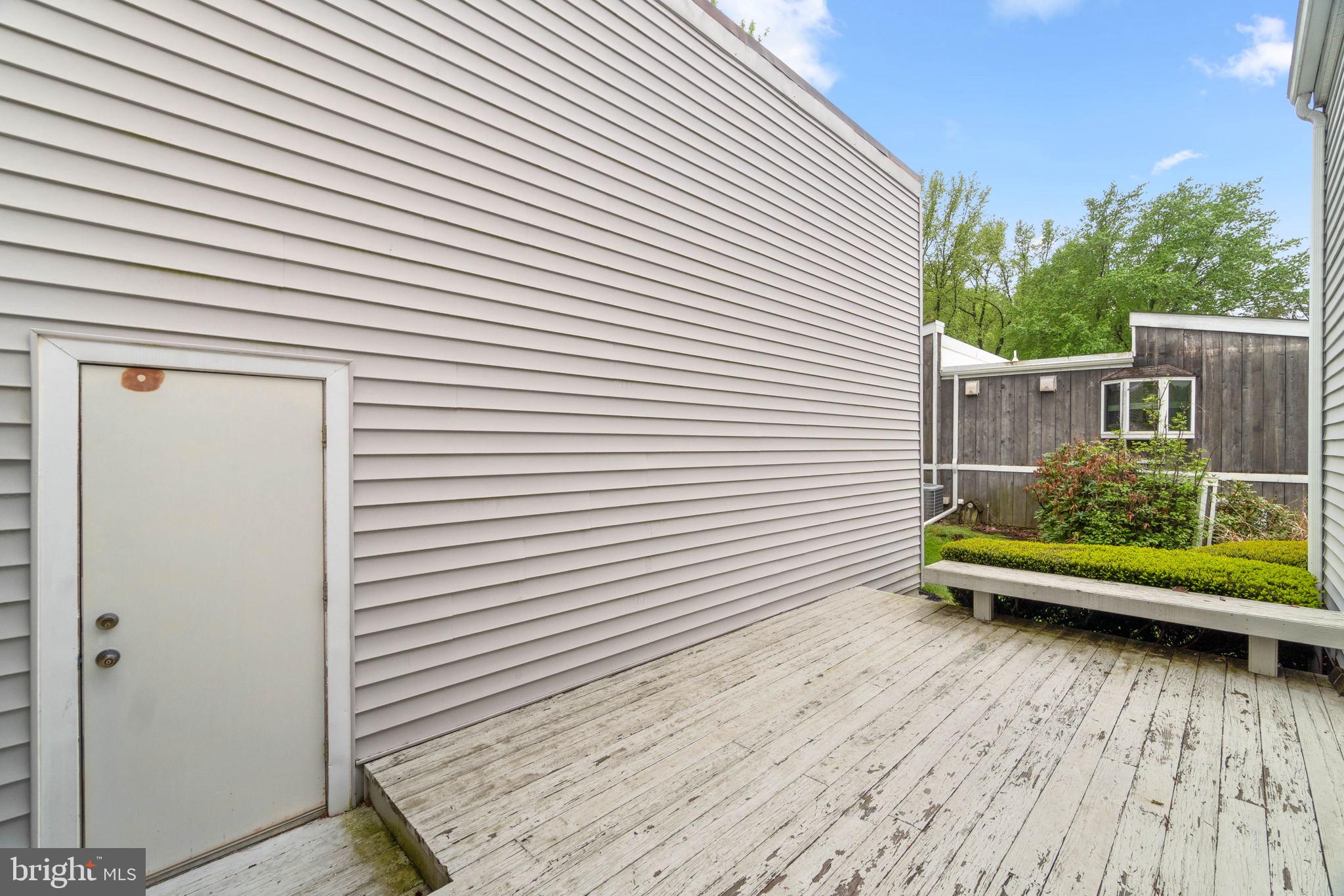 11102 Willow Bottom Drive Columbia, MD 21044 - Photo 27 of 44 Front patio between garage and home.