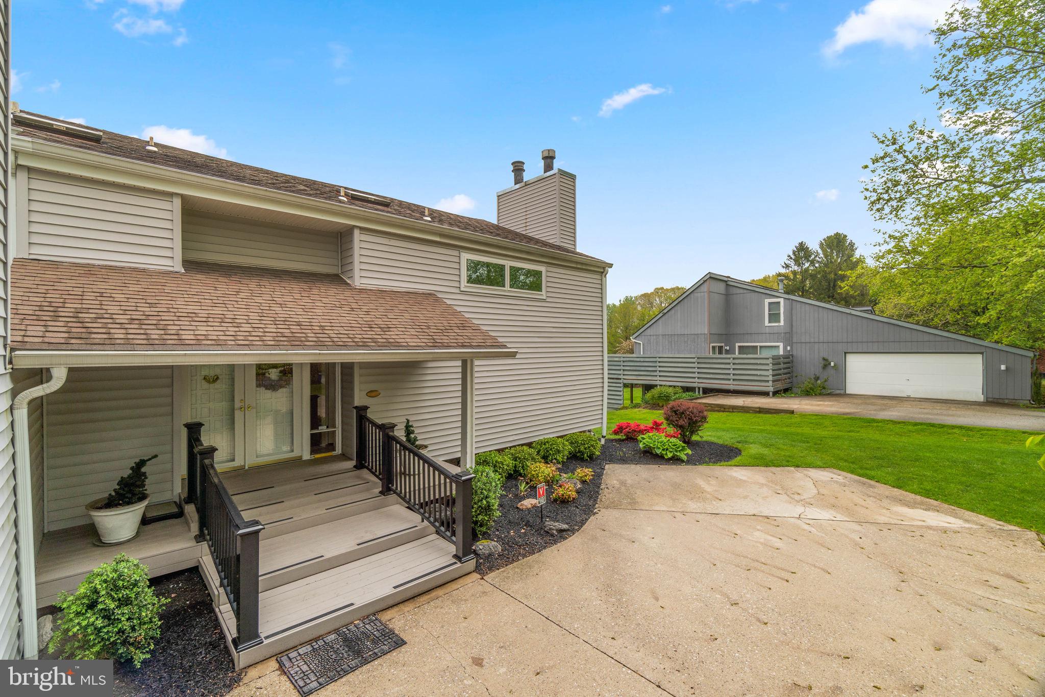 11102 Willow Bottom Drive Columbia, MD 21044 - Photo 4 of 44 Covered composite porch/walkway.