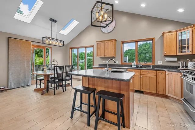 a view of a kitchen and dining room