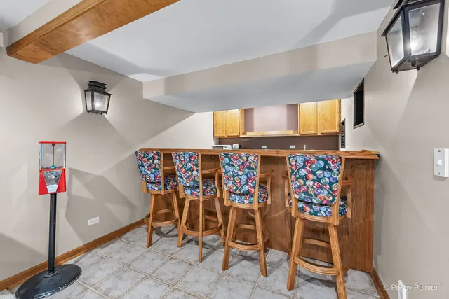 a bathroom with a sink toilet and a mirror